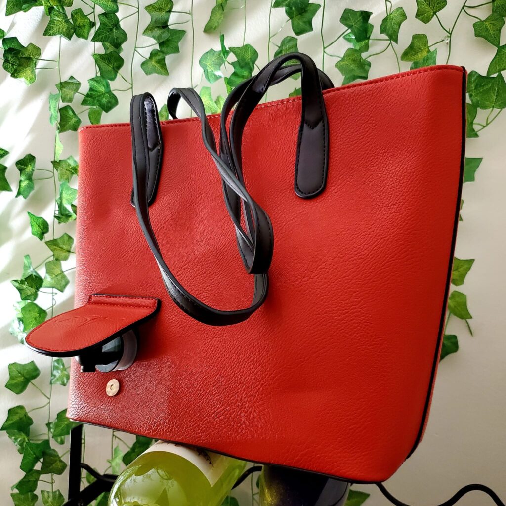 PortoVino Classic Red Vegan Leather wine bag image via Vaughn Lowery for use by 360 MAGAZINE