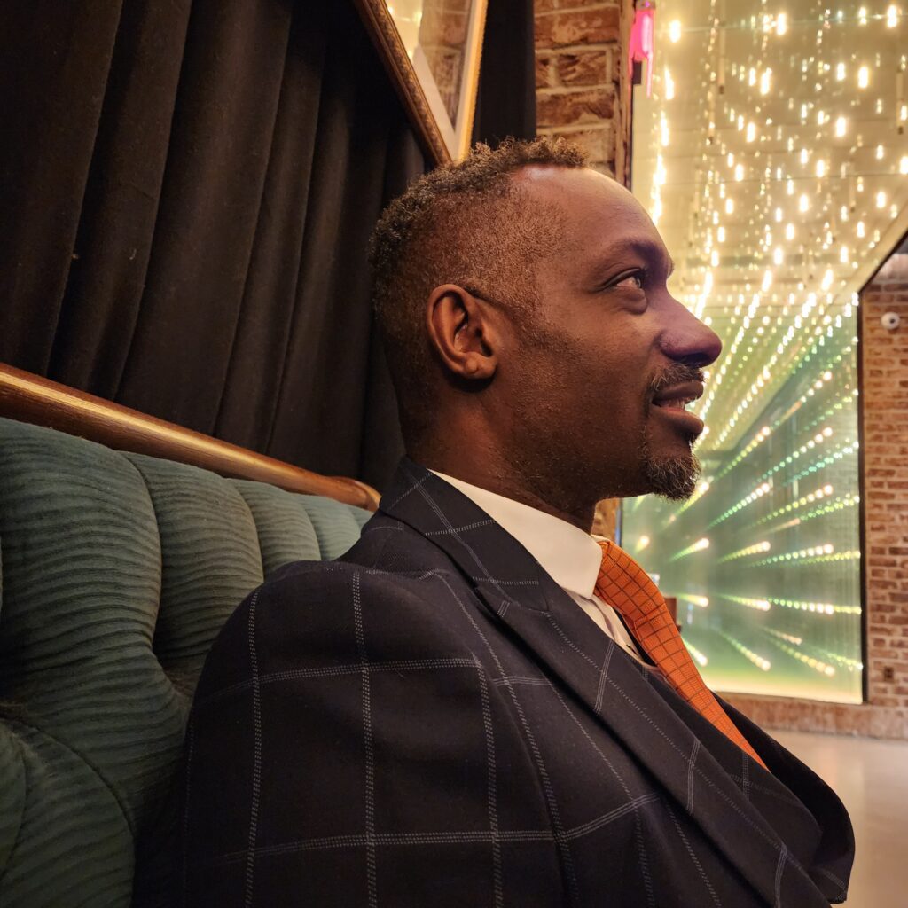 Orator and Nightlife Director Arthur J Rutledge captured at Civilian Hotel in NYC photographed by Vaughn Lowery for 360 MAGAZINE's brigade concierge agency.