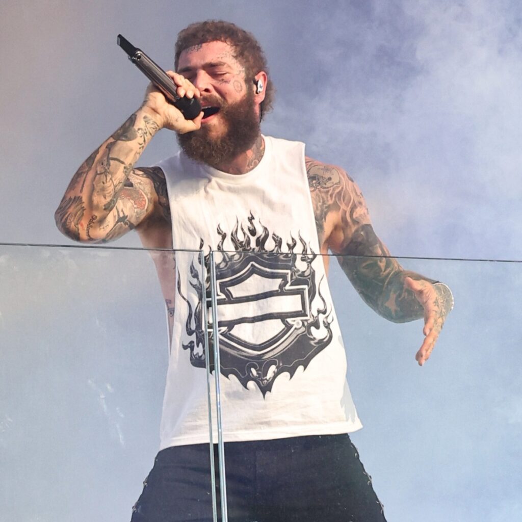 NEW YORK, NEW YORK - JULY 18: Fans gather to watch Post Malone perform live at TSX in Times Square on July 18, 2023 in New York City. (Photo by Jamie McCarthy/Getty Images for TSX Entertainment) via 360 MAGAZINE.