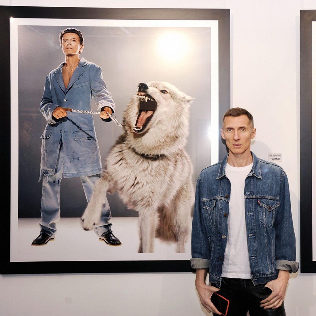 Markus Klinko at a David Bowie portrait exhibition via 360 Magazine. 