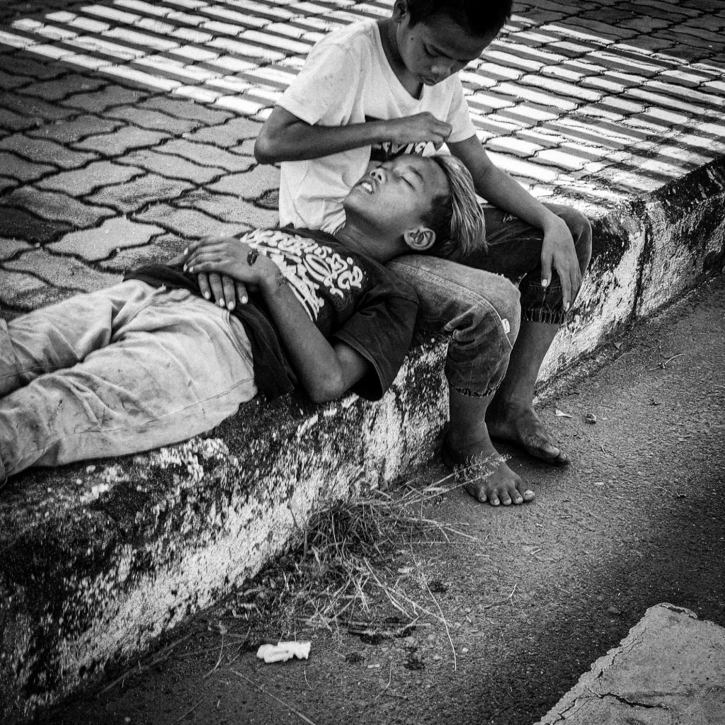 Lean on me, friends in Phnom Penh, captured by Vaughn Lowery via 360 Magazine. 